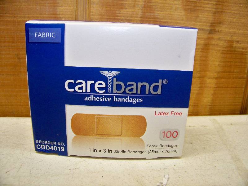 lot 558 image: 12 Boxes Care Brand Bandages