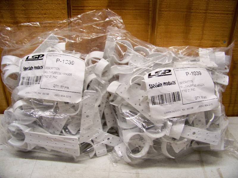 lot 606 image: 100 Multi-Purpose Pipe Hangers