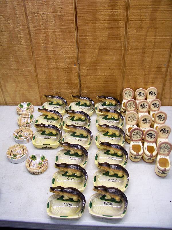 lot 693 image: 33 Florida Ashtrays