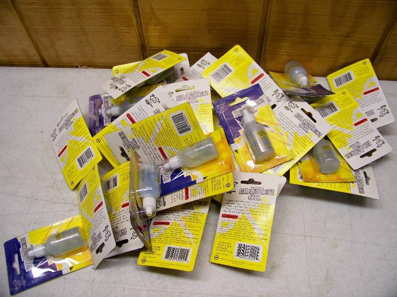 lot 706 image: 29 Bottles Paintball Marker Oil