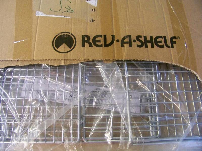 lot 983 image: Rev-A-Shelf Tilt Out Hamper Basket