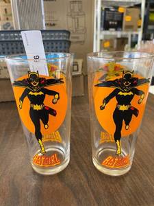 lot 6 image: Pair of batgirl 1976 Pepsi glasses