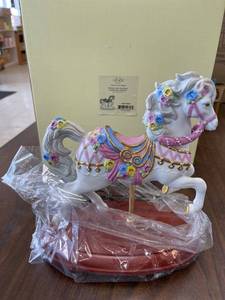 lot 15 image: Lennox pearls and pansies carousel horse
