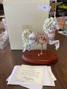 lot 16 image: Lennox topaz and tulips carousel horse