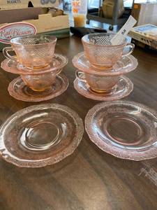 lot 58 image: Pink depression tea cups and saucers