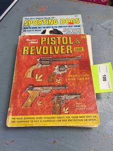 lot 100 image: Shooters Bible pistol and revolver guide, sporting dogs book
