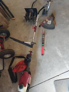lot 1016 image: Poulan Pro Link gas string trimmer with edger and till attachments and Craftsman xq trimmer line