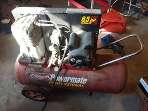 lot 1018 image: Coleman professional 25 gallon air compressor