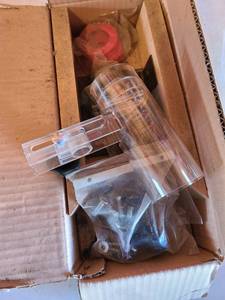 lot 1055 image: Box of extra parts for router or router table