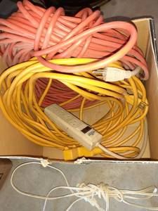 lot 1115 image: Surge protector and extension cords