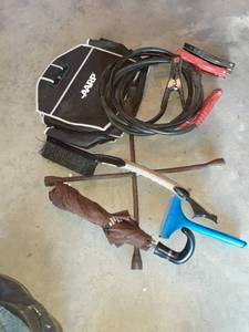 lot 1119 image: Car accessories. Ice scrapers, jumper cables, 4 way, tag brackets, tire guage and more