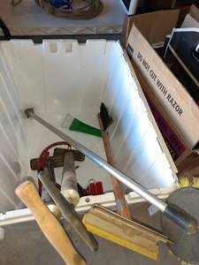 lot 1120 image: Car accessories and more. 2 hand pumps, ice scrapers (one is electric) and a stain sprayer