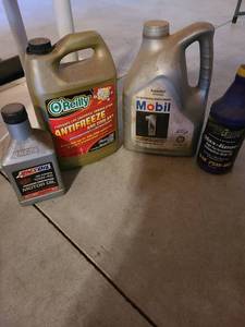 lot 1135 image: Antifreeze and oil