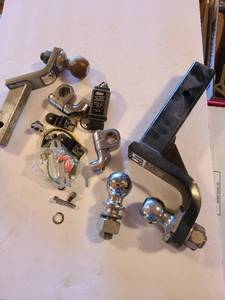 lot 1319 image: Trailer hitch items. One 2 ball, two 1 78 balls.