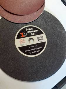 lot 1376 image: 2 Pearl abrasive cutt off wheels and sanding discs.