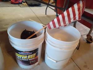 lot 1407 image: Bucket of sand (12) and oil absorbent (14) and 2 flags