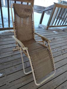 lot 3012 image: Alpine Design tan zero gravity patio chair