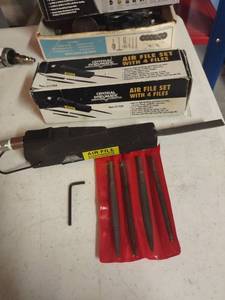 lot 1521 image: Central Pneumatic air file with extra files