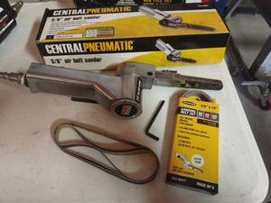 lot 1522 image: Central Pneumatic 38 air belt sander with belt sanding pack