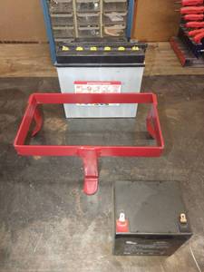 lot 1549 image: Batteries and battery stand