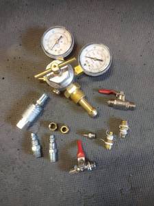 lot 1594 image: Pressure regulator gauges and air attachments