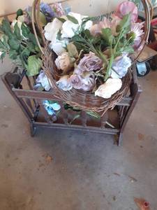 lot 2012 image: Plastic magazine rack with basket and faux flowers