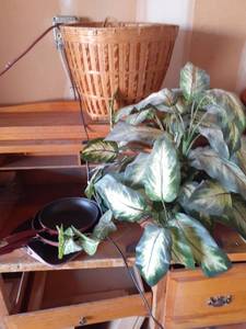 lot 2014 image: Large basket with faux greenery and some Kitchen Aid pans