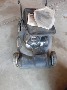 lot 2038 image: Craftsman lawn mower with bag