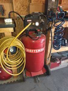 lot 1024 image: Craftsman 33 gallon dual hose air tank with pressure regulator and attached hoses
