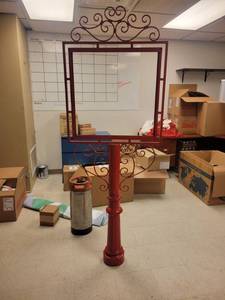 lot 2961 image: Red Cast Iron Sign Holder