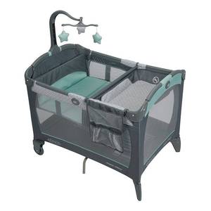 lot 39955 image: Graco Pack n Play Change n Carry Playard with Bassinet, Manor