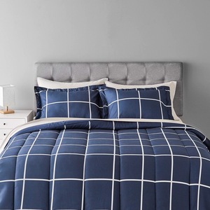 lot 2416 image: Amazon Basics - 7-Piece Lightweight Microfiber Bed-in-a-Bag Comforter Bedding Set - King Navy  - Retail $54.00