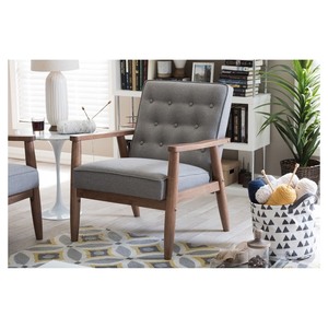 lot 2281 image: Baxton Studio - Sorrento Retro Modern Faux Leather Lounge Chair - GREY (Not Black as Shown in Stock Photo) - Retail $299.50