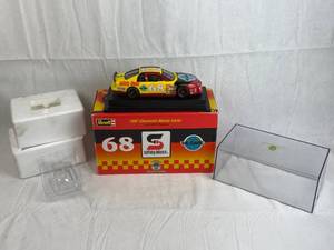 lot 7653 image: Revell Die Cast Metal Model Race Care - #68 safety-kleen - 1997 Chevy Monte Carlo w Original Box and Display Case - Very nice