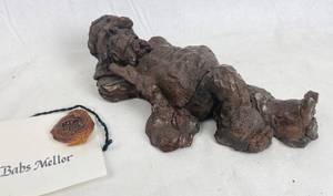 lot 7697 image: Vintage Man Laying Down Sculpture by Babs Mellor, Artist from Wichita - Very Collectible