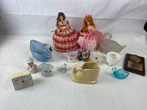 lot 9133 image: Wind-up Alarm Clock, Blue Glass Swan, Clear Glass Swan, Off White Ceramic Swan USA N.S.C.O., Barbie Dolls w Homemade Dresses, Avon 2001 Figurine & More