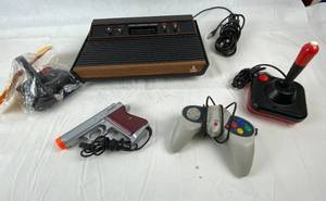 lot 7659 image: Atari Game Console Video Computer System M#CX-2600 A, Cords and Controllers As Shown