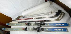 lot 7730 image: Lot of Skis, Ski Poles, Hockey Sticks and a Foam Roller - Get your Exercise On