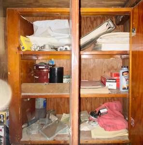 lot 6135 image: Contents of Wooden Cabinet in Garage