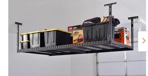 lot 143 image: Husky 42 in. H x 96 in. W x 32 in. D Adjustable Height Ceiling Mount Garage Rack