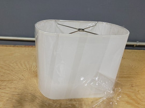 lot 17002 image: White Oval Lampshape 13.5LX8WX10T Inches
