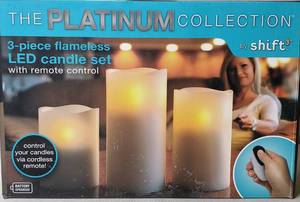 lot 98 image: THE PLATINUM COLLECTION 3-PIECE FLAMELESS LED CANDLE SET - WITH REMOTE CONTROL