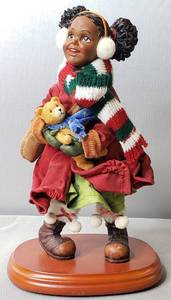 lot 99 image: Dillards Trimmings, Little Winter Girl, 9.5H & 5W
