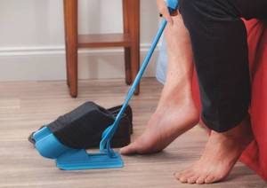 lot 100 image: As Seen On Tv Sock Slider - The Fastest Easiest Way To Put Socks On