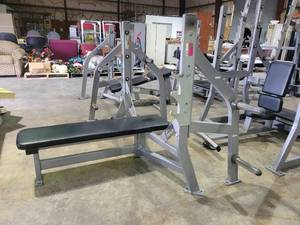 lot 9130 image: Hammer Strength Military Weight Bench with Weight Storage