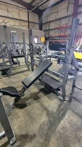 lot 9132 image: Hammer Strength Military Weight Bench W Weight Storage