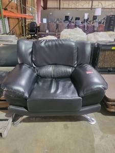 lot 9296 image: Over Sized Black Pleather Lounge Chair