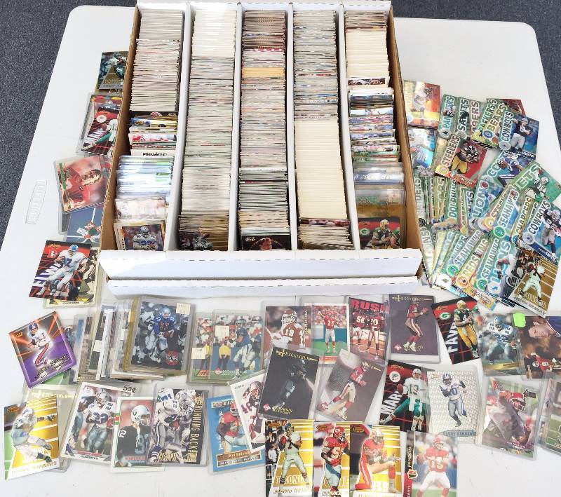 lot 1010 image: 5,000 Count Box Jam Packet With Football Superstars - Rookies - Inserts & More - Book Value Over $500 - A True Treasure Hunt