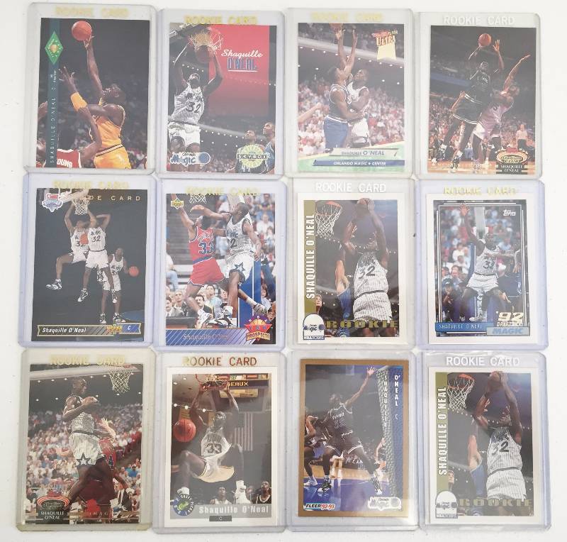 lot 1014 image: Shaquille SHAQ Oneal (12) DIFFERENT Rookie Card Lot - You will never see this again Newest Hall of Famer  Huge Book Value $250 