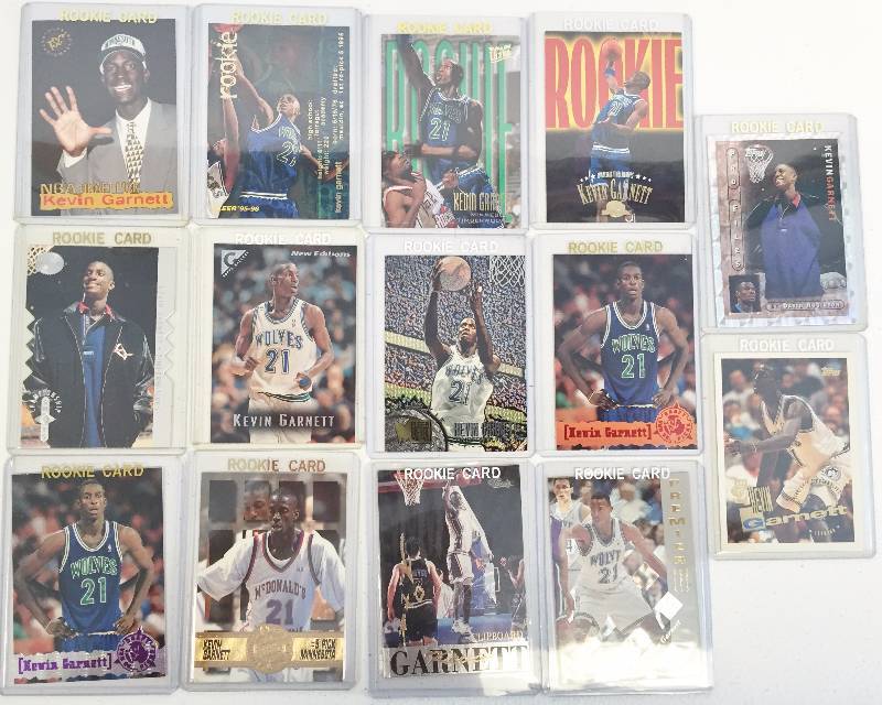 lot 1045 image: Kevin Garnett Rookie Card Lot - 14 Different Rookie Cards - Book Value Over $150 - Awesome Investment Lot - NBA Legend - Hall Of Famer